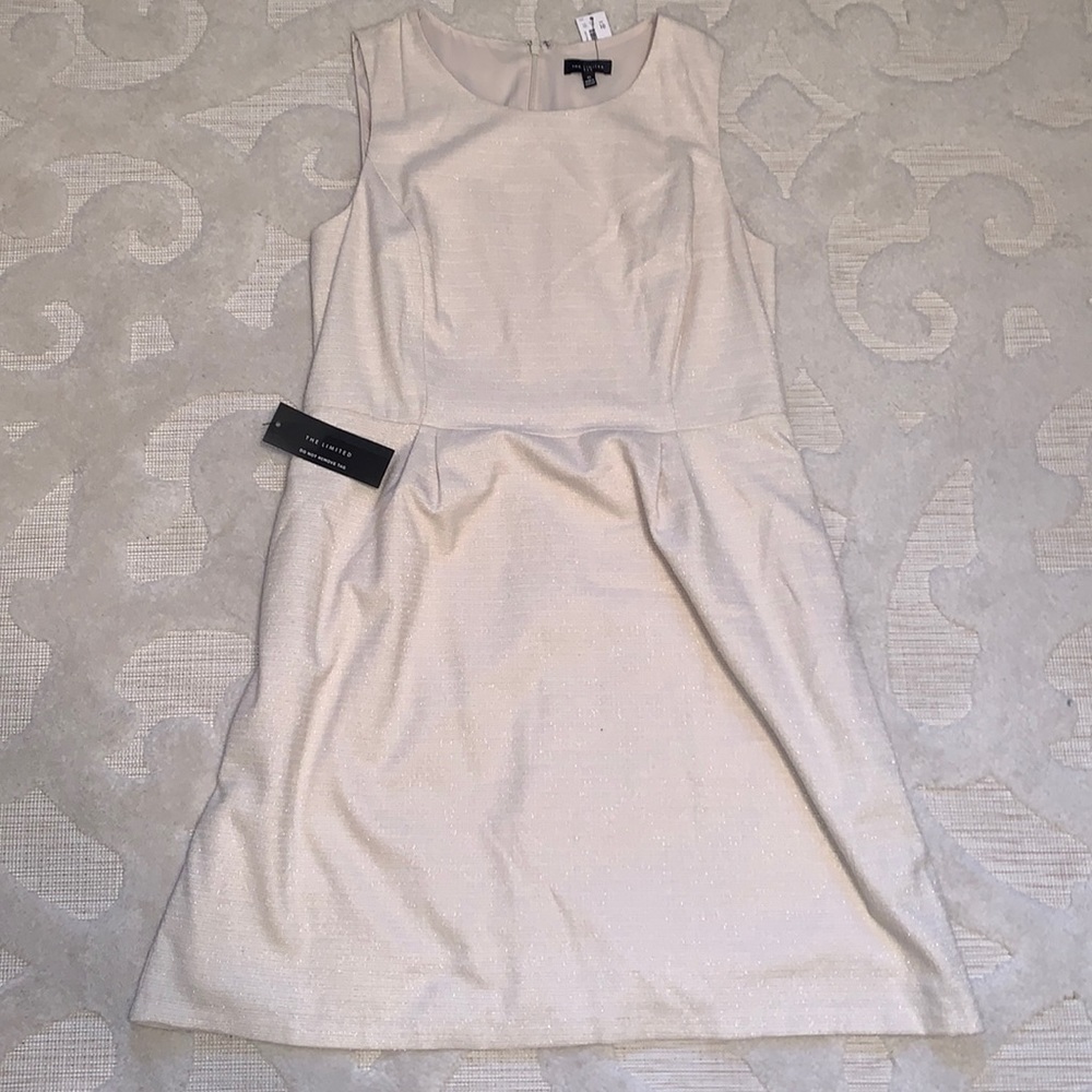 The limited cream and gold color dress